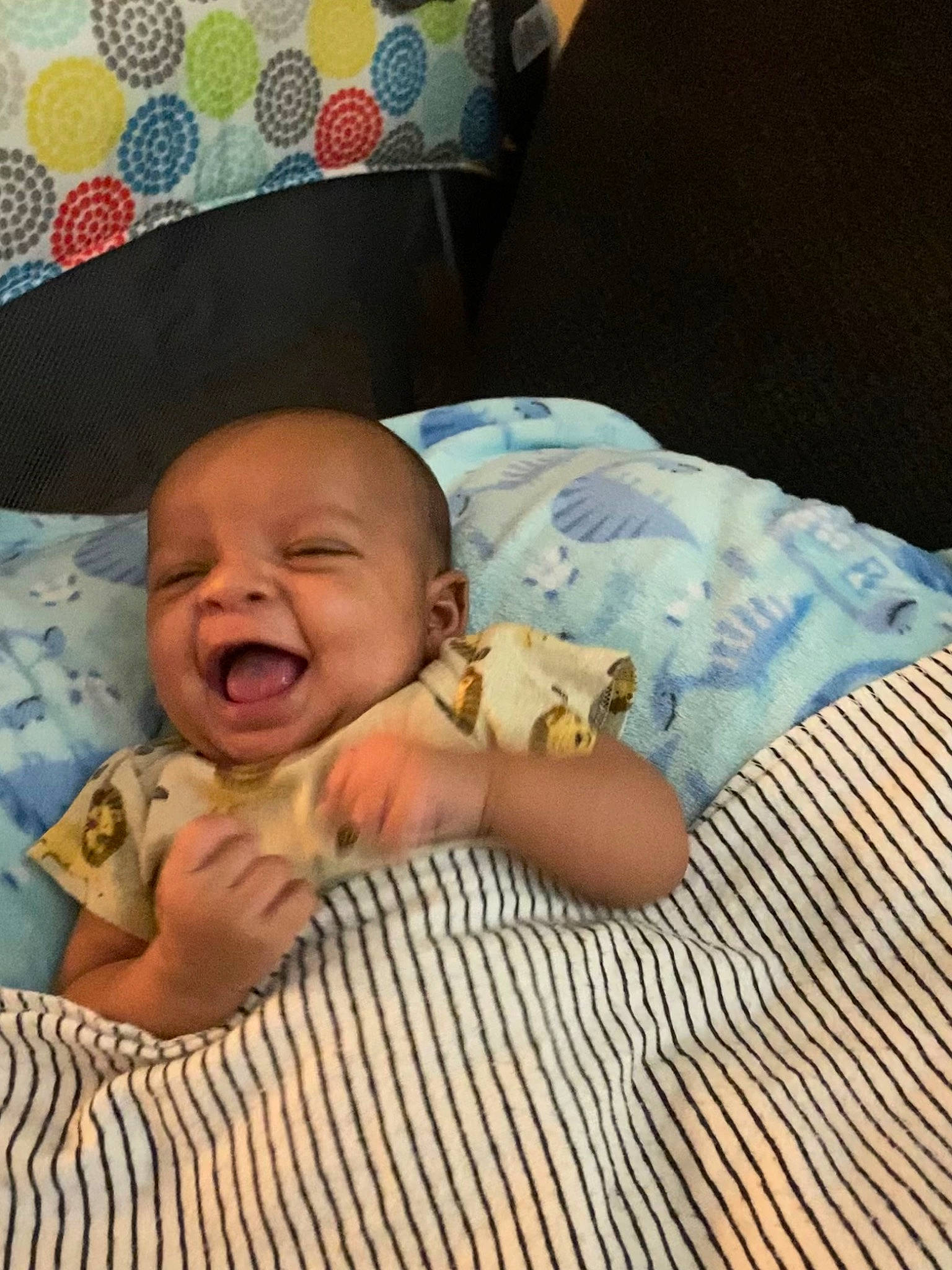 Taben Drake joined the competition — help win amazing prizes! baby, baby_laughing, baby_products, baby_toddler_clothing, bed, bedding, cheek, chin, comfort, eye, face, finger, happy, head, infant_bed, linens, person, smile, textile, thumb