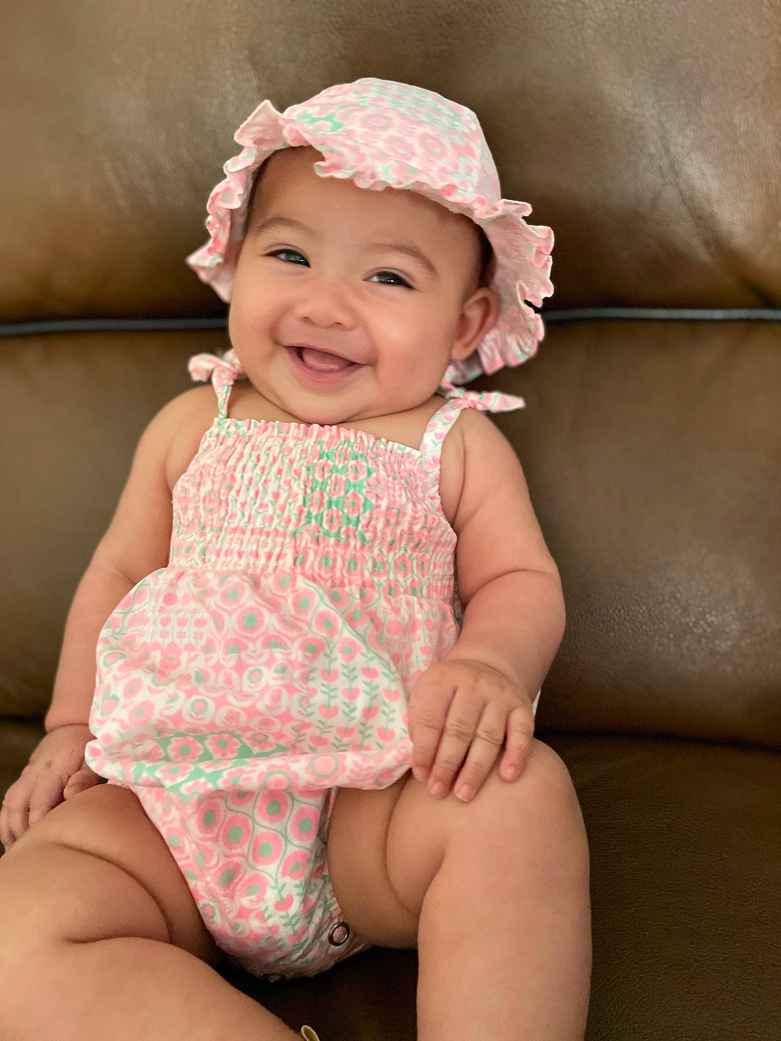 Delilah joined the competition — help win amazing prizes! baby, baby_toddler_clothing, child, eye, face, flash_photography, happy, head, headwear, human_body, iris, joy, knee, leg, lip, mouth, neck, person, pink, skin