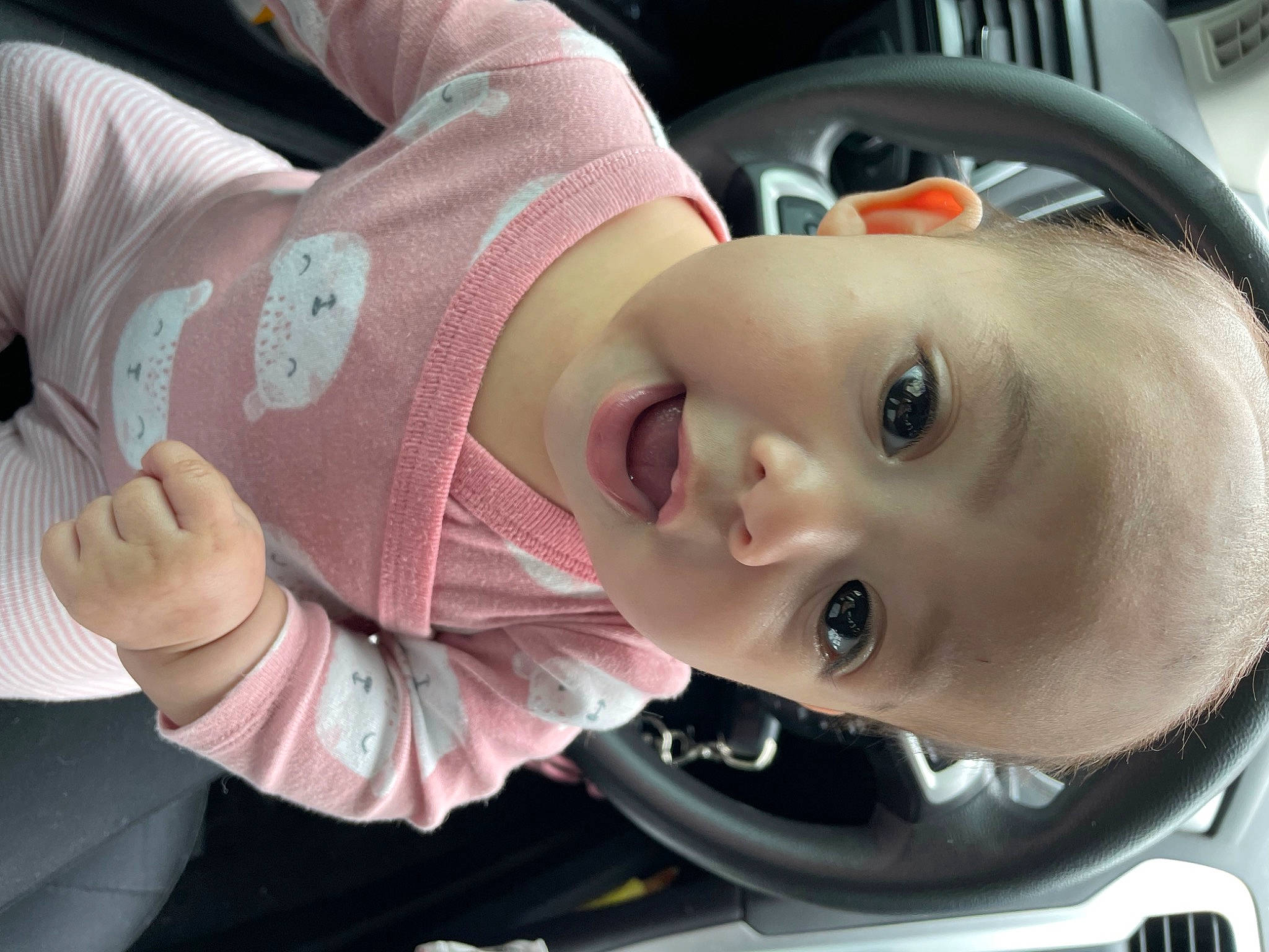 Delilah joined the competition — help win amazing prizes! baby, car_seat, cheek, child, cool, eyebrow, eyelash, facial_expression, fun, gesture, hat, lip, mouth, nose, person, skin, sleeve, smile, surprise, toddler