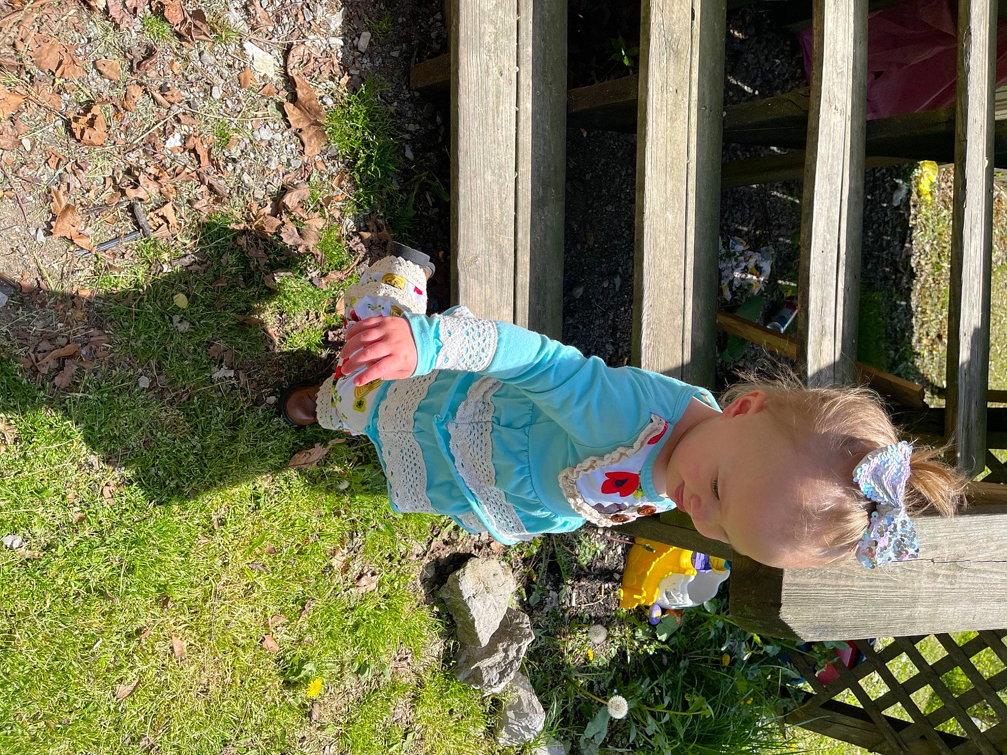 Chloe Ealy is registered to the contest to win money with this photo: baby, baby_toddler_clothing, backyard, child, fence, fun, garden, grass, groundcover, hat, landscape, lawn, leisure, people_in_nature, person, plant, play, recreation, toddler, tree
