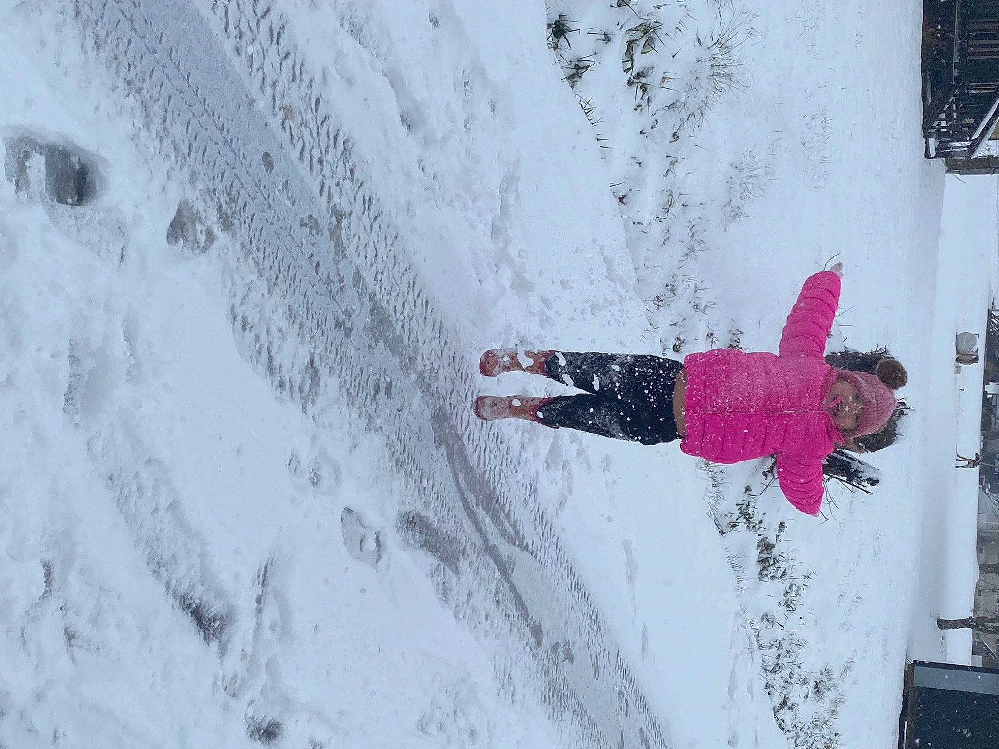 Chloe is registered to the contest to win money with this photo: concrete, freezing, fun, geological_phenomenon, glacial_landform, ice_cap, leisure, magenta, person, precipitation, recreation, shadow, slope, snow, tree, vacation, visual_arts, window, winter