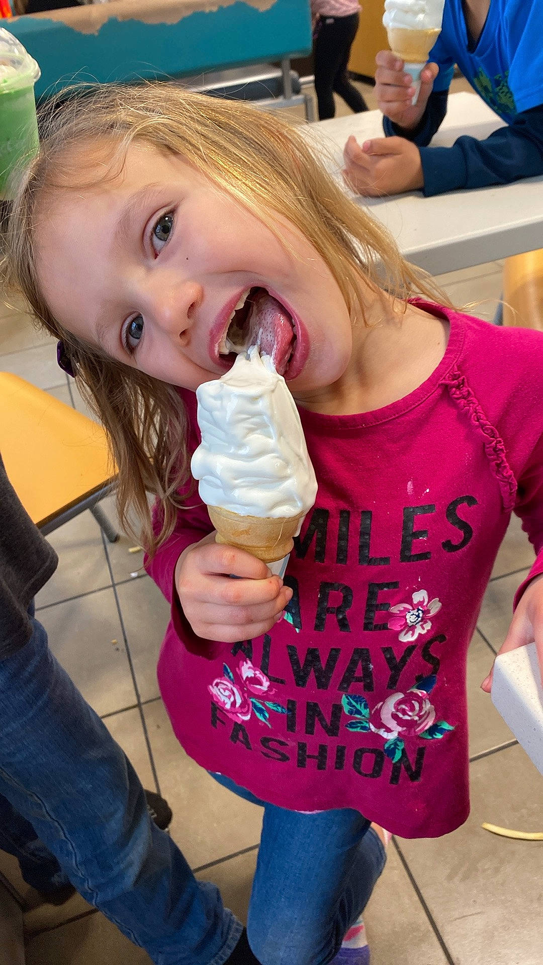 Chloe is registered to the contest to win money with this photo: blond, child, cuisine, dairy, dessert, dondurma, drink, fast_food, food, frozen_dessert, fun, gelato, happy, ice_cream, ice_cream_cone, ingredient, jeans, person, smile, soft_serve_ice_creams