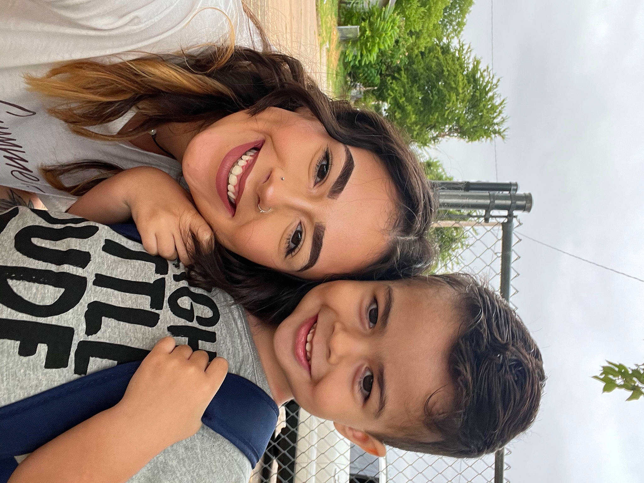 Grayson is registered to the contest to win money with this photo: black_hair, eye, eyebrow, eyelash, facial_expression, flash_photography, fun, gesture, grass, happy, joy, leisure, lip, mouth, person, plant, shoulder, skin, sky, smile