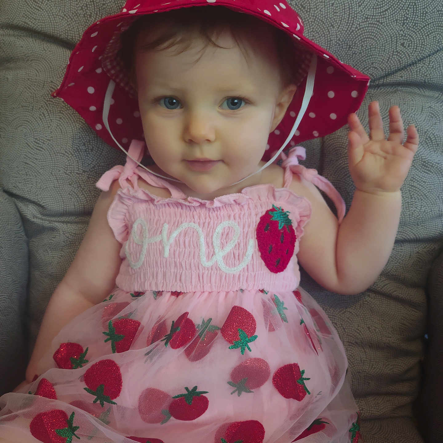 Shelby joined the competition — help win amazing prizes! baby, bodypart, bonnet, cap, clothing, couch, doll, dress, face, finger, furniture, hand, hat, head, person, photography, portrait, sitting, sunhat, toy