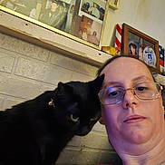 Abby joined the competition — help win amazing prizes! accessories, adult, animal, blackcat, cat, clothing, face, female, glasses, hat, head, jewelry, male, man, necklace, person, pet, photography, portrait, woman