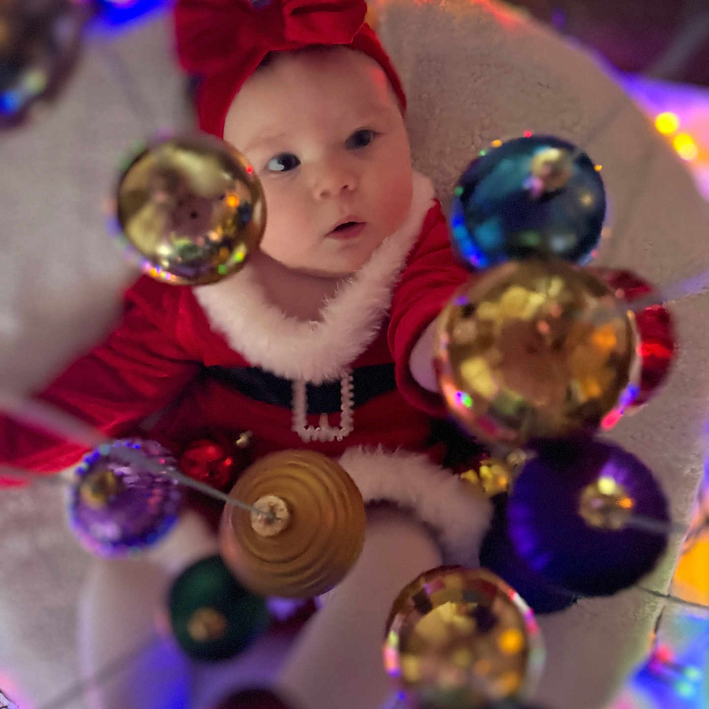 Nova joined the competition — help win amazing prizes! accessories, baby, bead, bodypart, bonnet, clothing, costume, face, festival, finger, food, hand, hat, head, lighting, ornament, person, purple, sphere, sweets