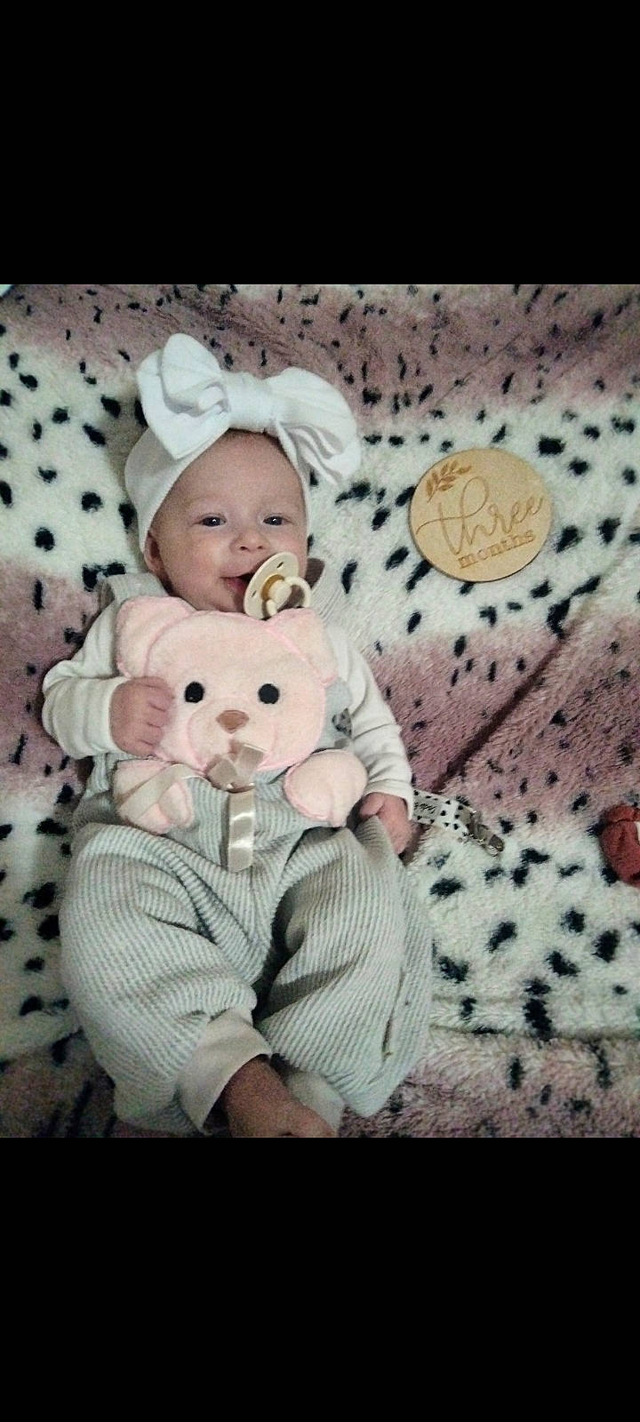 Jazlynn is registered to the contest to win money with this photo: baby, baby_toddler_clothing, bedding, child, comfort, happy, linens, mammal, pattern, person, pink, product, room, sitting, sleeve, textile, toddler, vertebrate