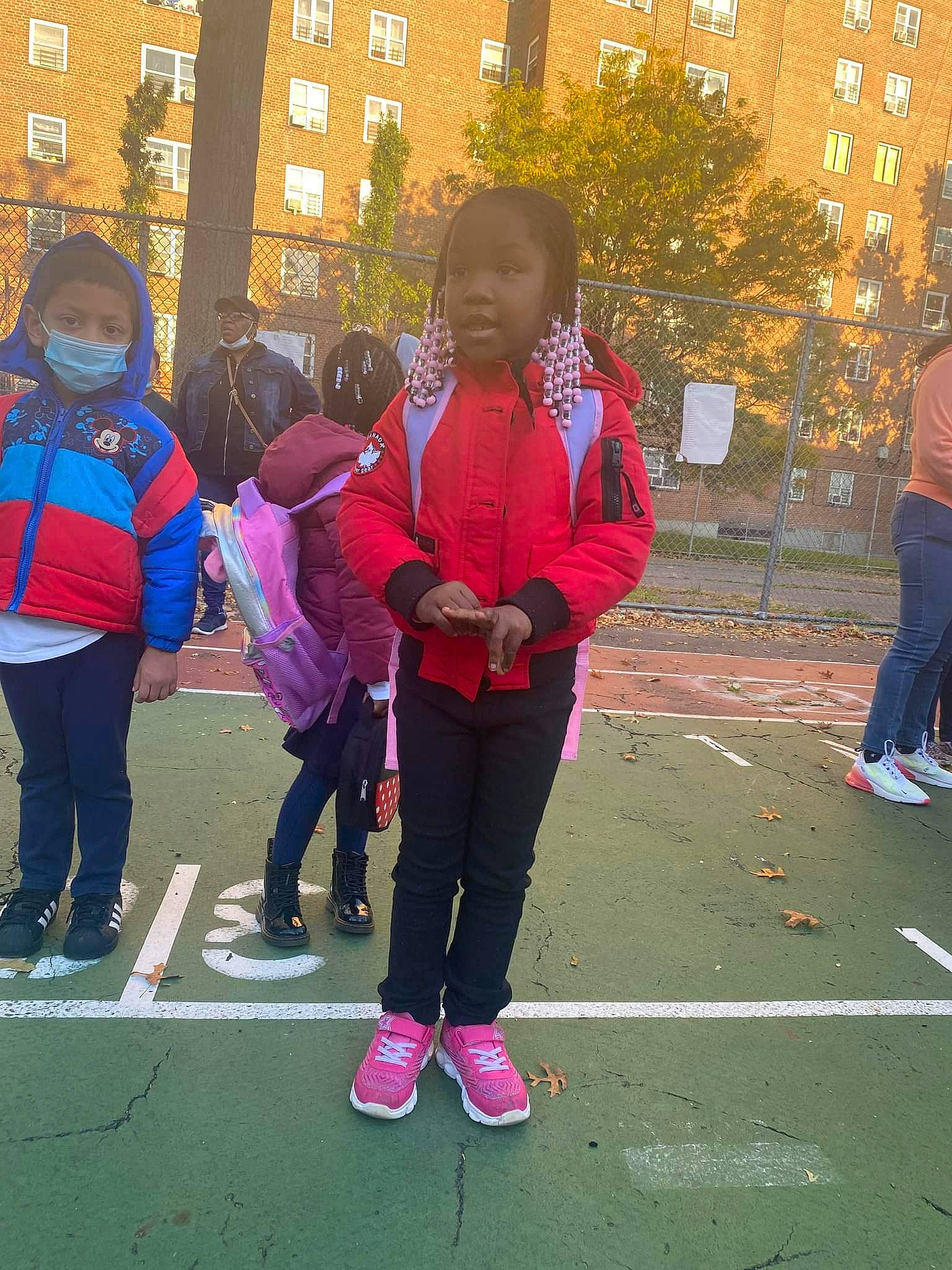 Crystianna is registered to the contest to win money with this photo: active_pants, electric_blue, event, footwear, fun, grass, happy, headwear, leisure, magenta, outerwear, person, pink, recreation, sneakers, sports, sportswear, sweatpant, team, tree