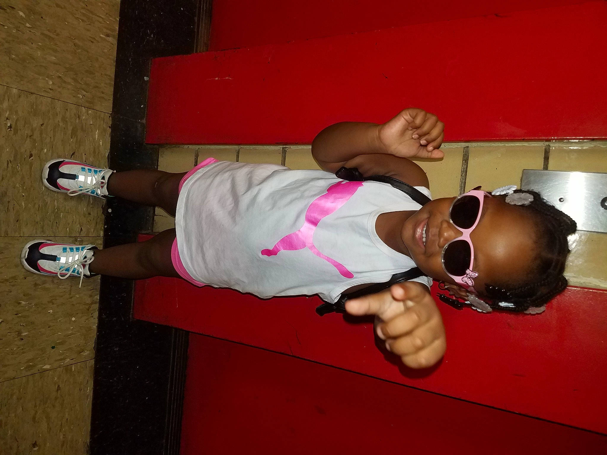 Crystianna is registered to the contest to win money with this photo: art, elbow, eyewear, fun, goggles, happy, human_leg, joy, knee, magenta, person, personal_protective_equipment, sleeve, sunglasses, t_shirt, thigh, thumb, toddler, walking_shoe, wrist