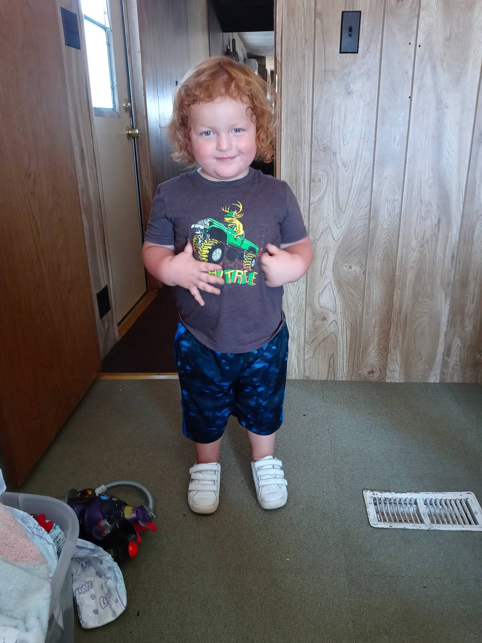 Levi Michael is registered to the contest to win money with this photo: child, joint, joy, leg, person, play, room, shoe, shoulder, standing, t_shirt, toddler, vacation