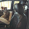 Kahyla participe au concours pour gagner de l'argent avec cette photo : animal, backseat, blanket, canine, car, collar, dog, dogs, ears, husky, interior, leather_seats, looking_at_camera, passenger, pets, pit_bull, road_trip, sitting, vehicle, window