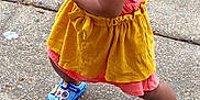 Ka Miyah-Kynd joined the competition — help win amazing prizes! blue_shoes, casual_clothing, child, concrete, cute, expression, footwear, fun, hair_pigtails, outdoor, pavement, person, pink_top, playful, pose, sippy_cup, summer, toddler, yellow_skirt, young_child