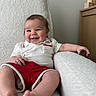 baby, chair, child, clothing, cozy, cute, furniture, happy, home, indoors, infant, person, playful, portrait, red_shorts, relaxing, smiling, texture, white, wooden_blocks