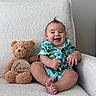 baby, bright, casual_clothing, chair, child, colorful, cozy, cute, happy, indoors, infant, plush_toy, portrait, short_hair, sitting, smiling, soft_fabric, teddy_bear, texture, wooden_sign