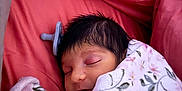 Ravi joined the competition — help win amazing prizes! baby, bed, blanket, child, comfort, coral_color, cute, face, floral_pattern, hair, indoors, infant, newborn, pacifier, peaceful, portrait, resting, sleeping, soft_texture, wrapped