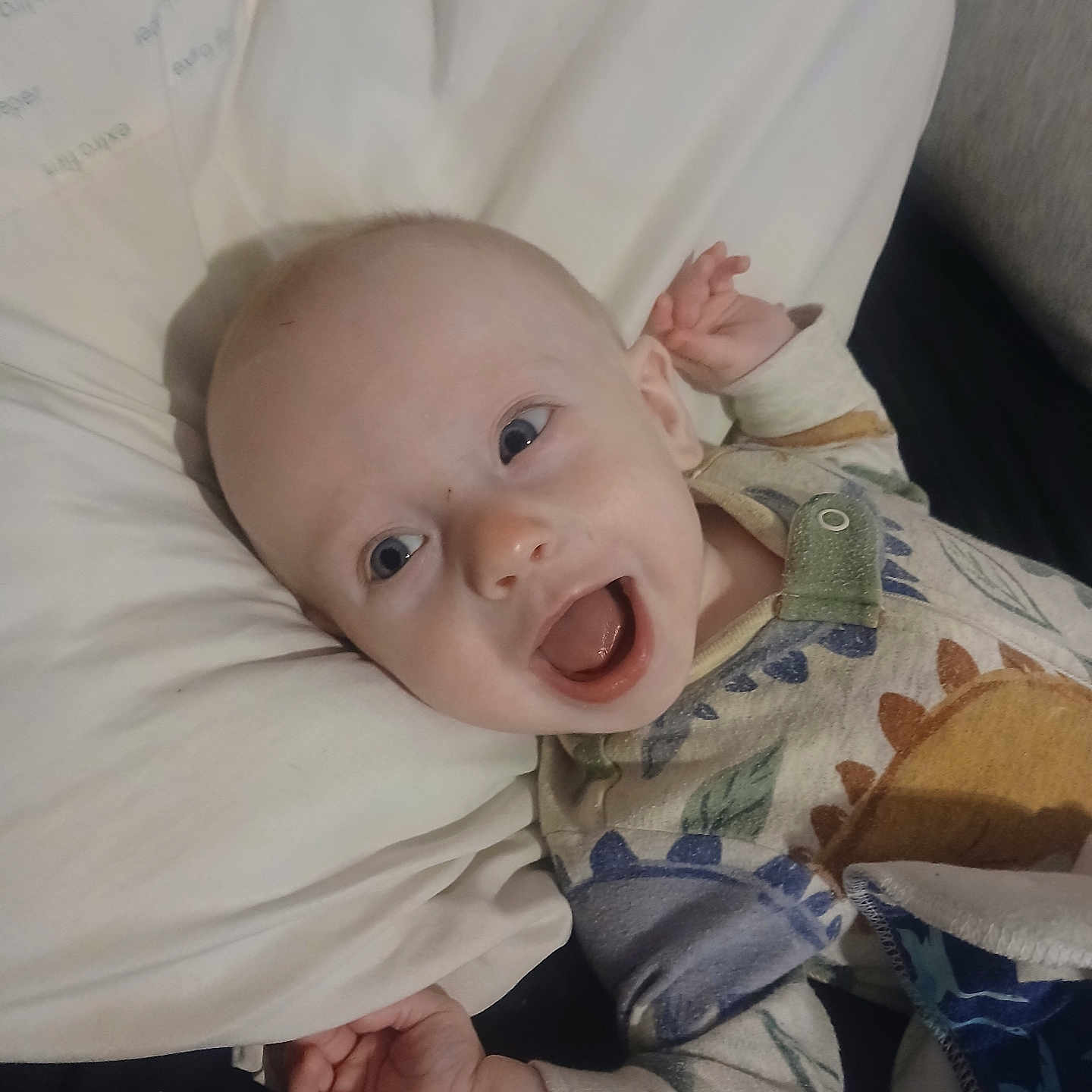 Jasper is registered to the contest to win money with this photo: baby, bed, bedroom, bodypart, clothing, couch, cushion, face, furniture, happy, head, homedecor, indoors, newborn, pants, person, photography, portrait, quilt, room