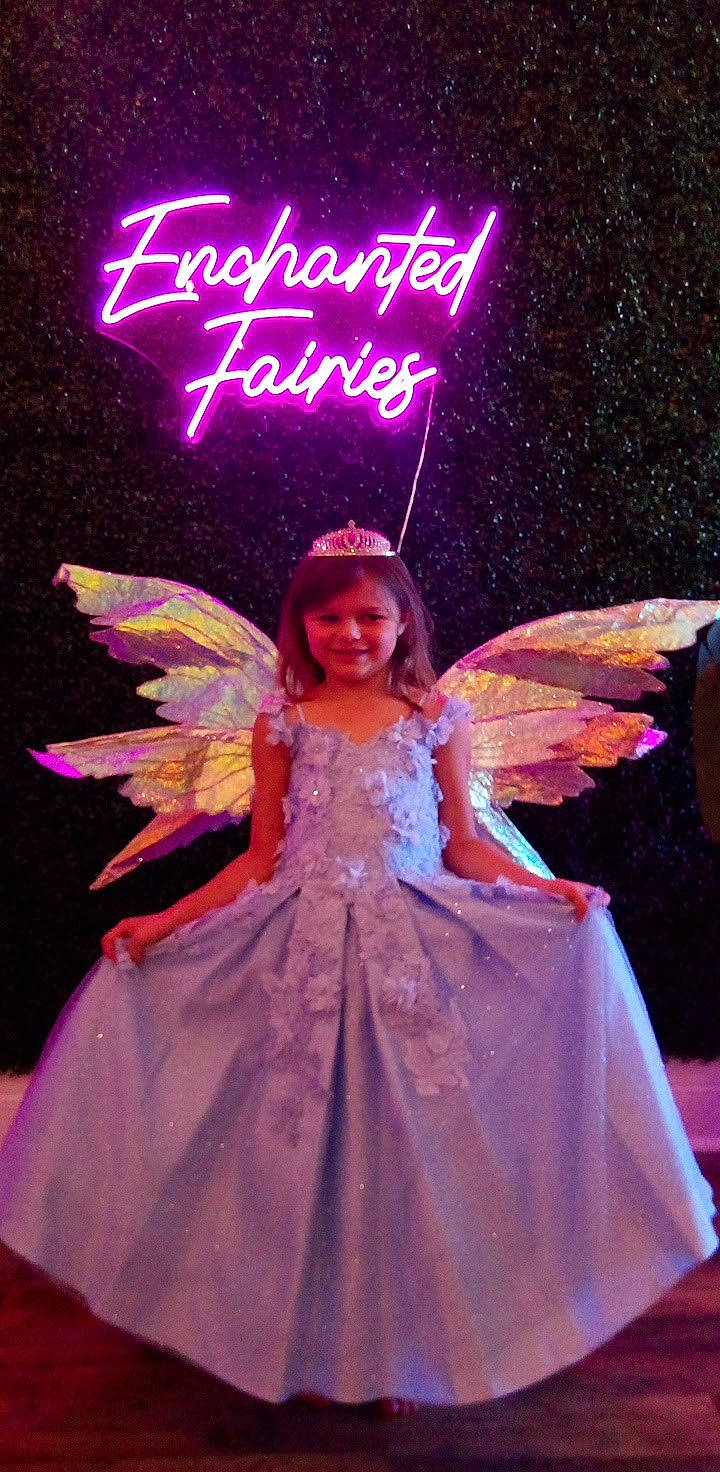 Diane is registered to the contest to win money with this photo: angel, beauty, costume, costume_design, dress, entertainment, event, fashion_design, fictional_character, fun, joy, light, magenta, mythical_creature, person, pink, purple, smile, supernatural_creature, toddler