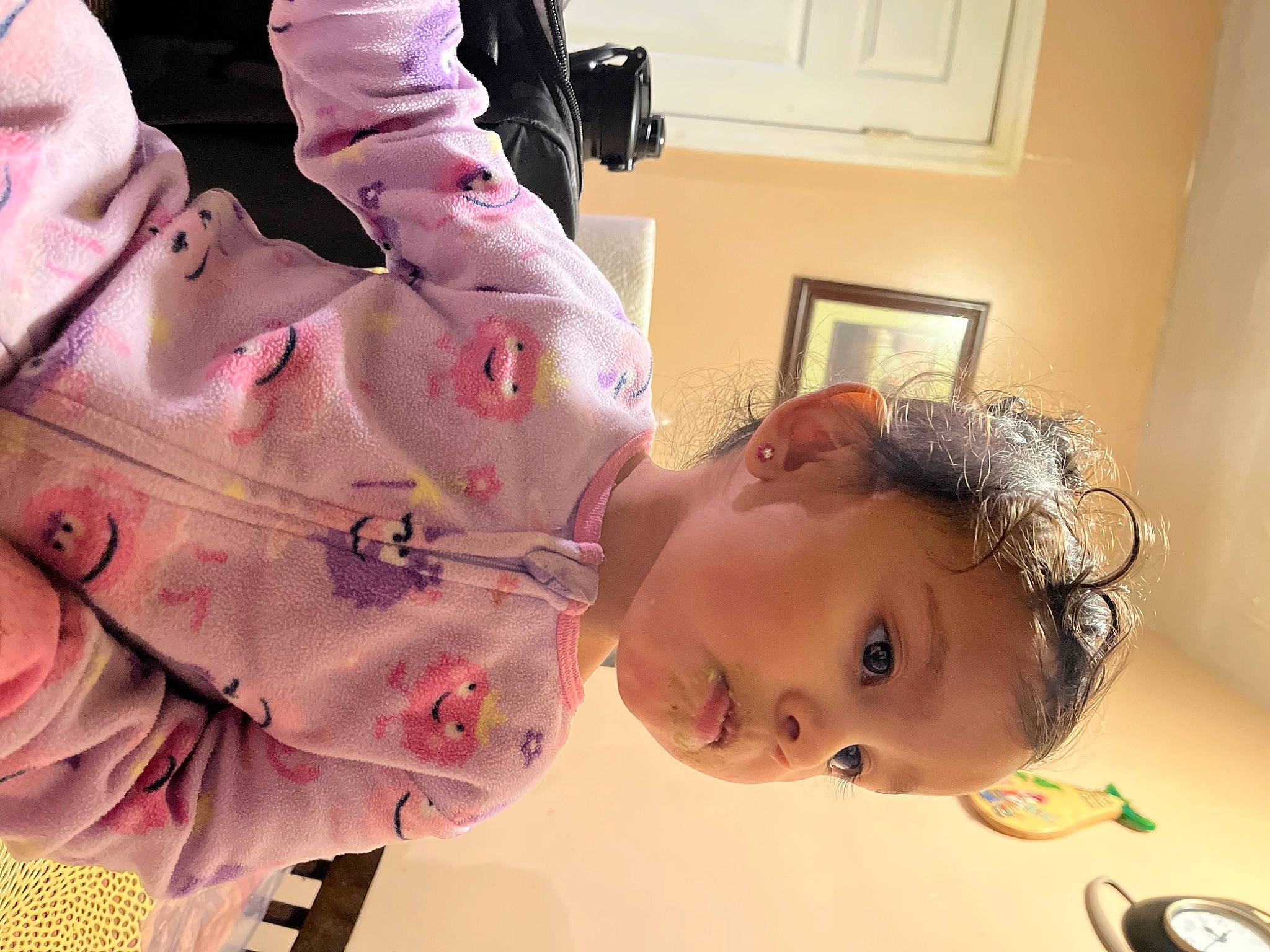 Noemi is registered to the contest to win money with this photo: baby, cheek, child, chin, dress, ear, eyebrow, eyelash, forehead, fun, happy, headgear, lip, mouth, neck, nose, person, plant, skin, toddler