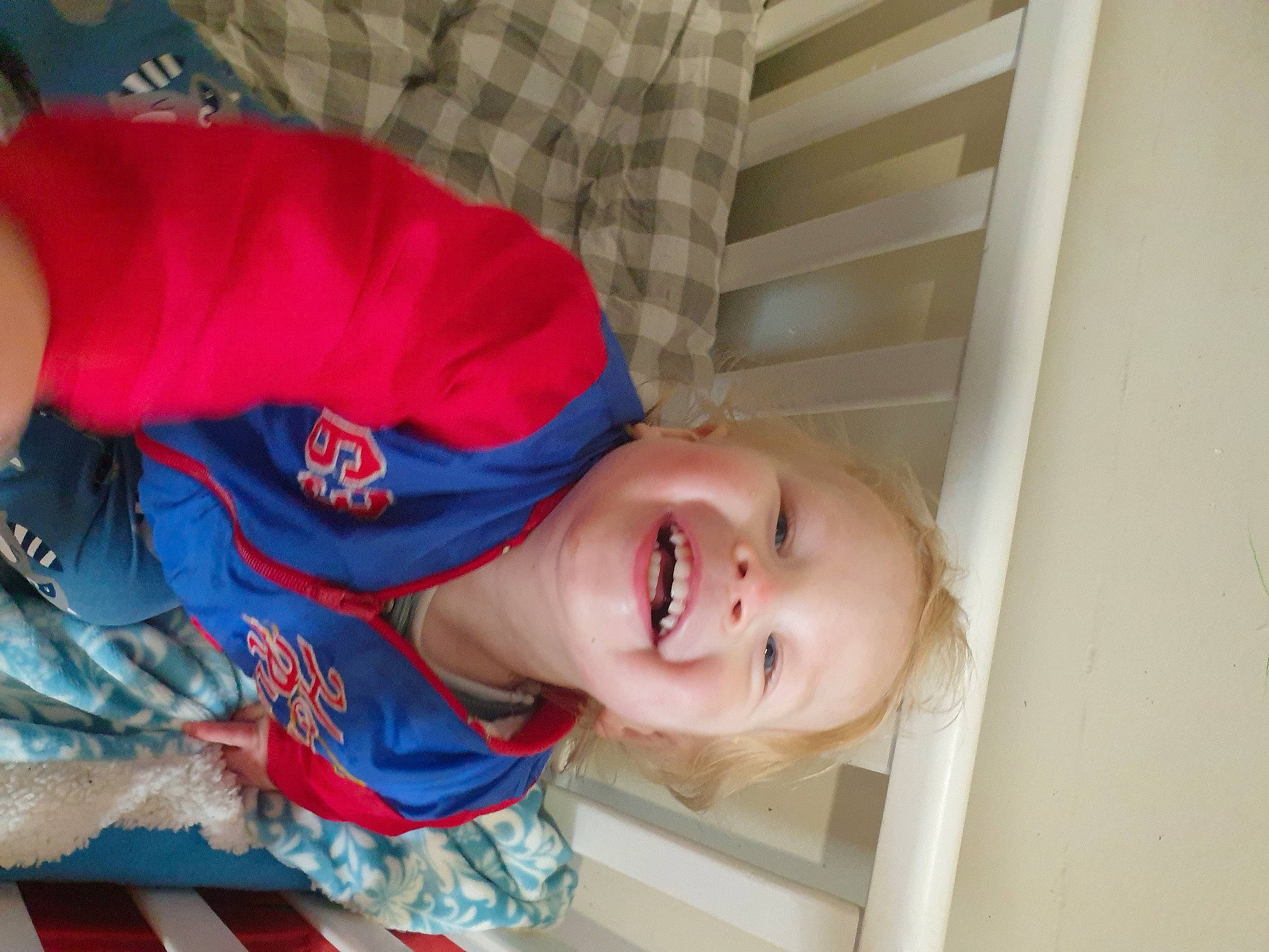 Creed is registered to the contest to win money with this photo: baby, baby_laughing, baby_products, baby_toddler_clothing, child, comfort, elbow, electric_blue, flooring, fun, happy, joy, leisure, nose, person, room, sleeve, smile, toddler, wood