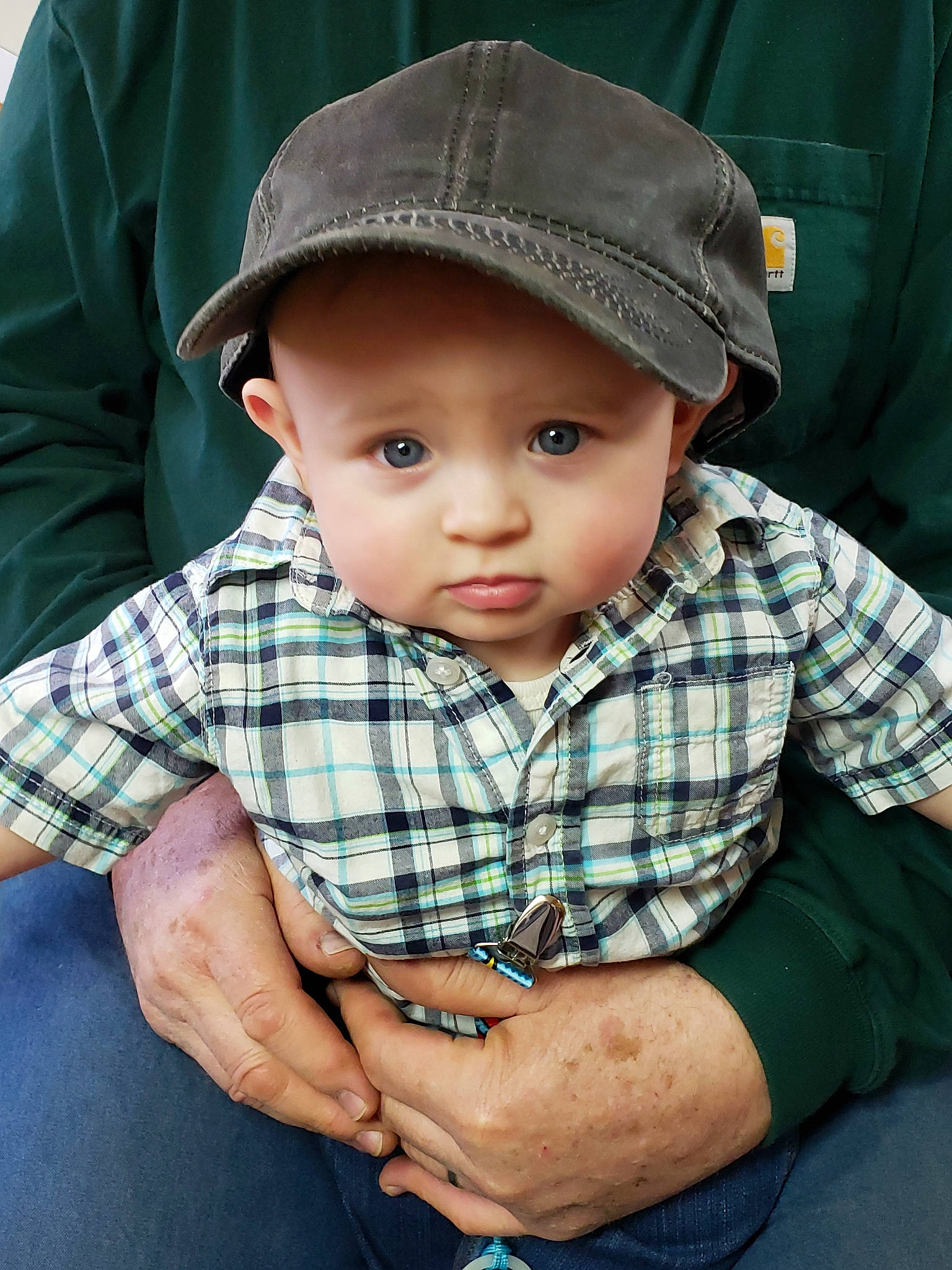Haden is registered to the contest to win money with this photo: baby, child, design, hat, pattern, person, plaid, sleeve, tartan, toddler