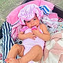 baby, infant, child, swimsuit, bonnet, blanket, towel, playmat, indoors, cute, skin, foot, hand, face, smile, striped, pink, relaxing, lying, soft
