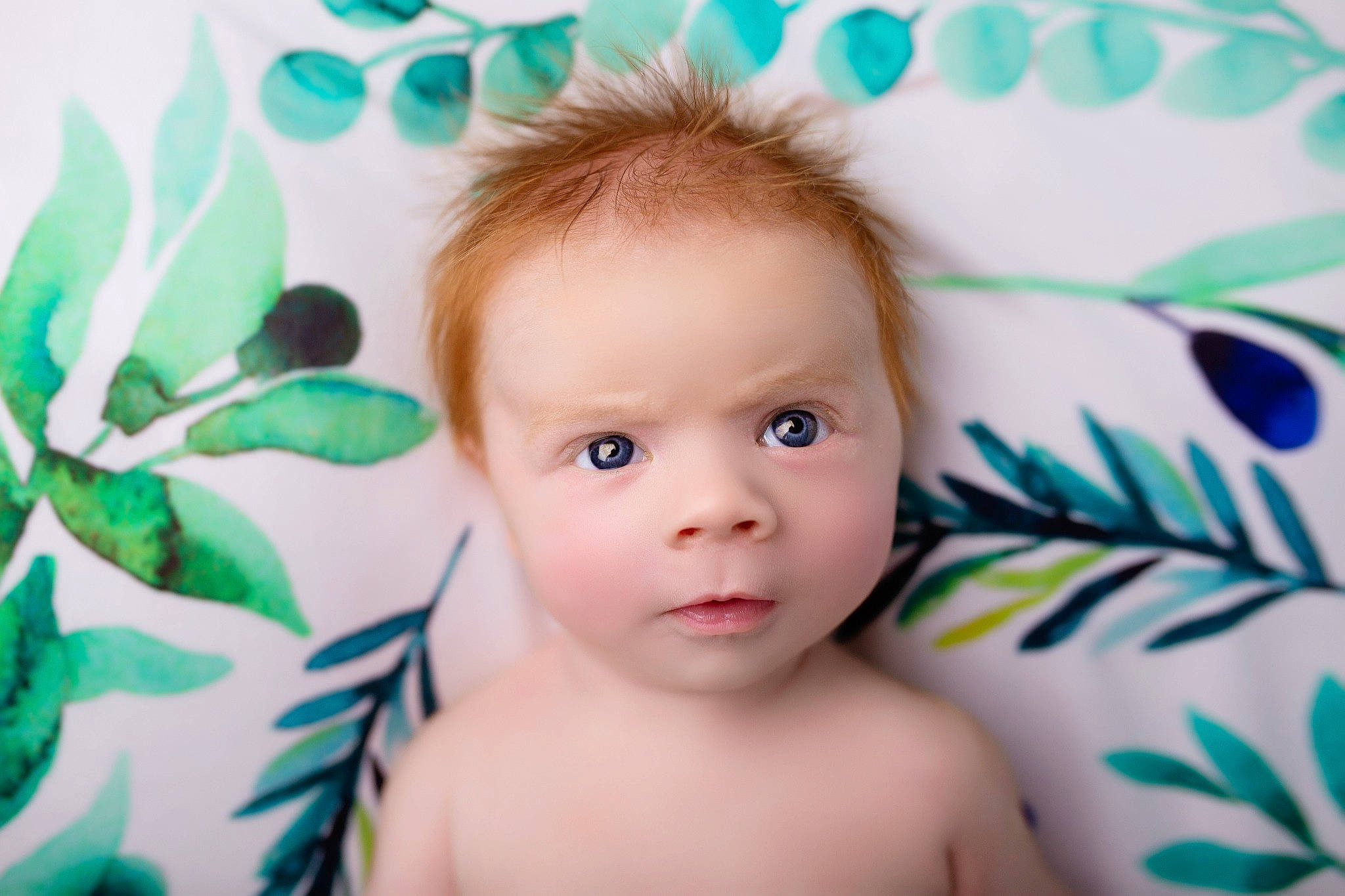 Rudi is registered to the contest to win money with this photo: baby, cheek, child, eye, face, head, iris, nose, person, photography, portrait_photography, skin, smile, toddler, turquoise