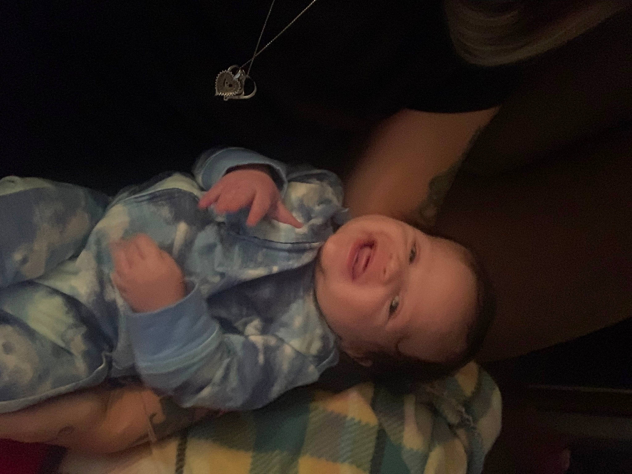 Kolby is registered to the contest to win money with this photo: abdomen, baby, baby_products, baby_toddler_clothing, cheek, child, comfort, darkness, ear, elbow, fun, human_body, mouth, nose, pattern, person, room, skin, sleep, smile