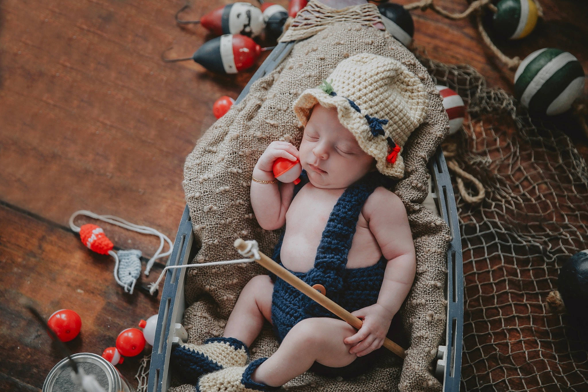 Corey is registered to the contest to win money with this photo: baby, baby_products, backpack, bag, child, city, fashion_accessory, fun, grass, hat, headwear, human_leg, leisure, luggage_and_bags, person, personal_protective_equipment, play, recreation, sitting, sun_hat