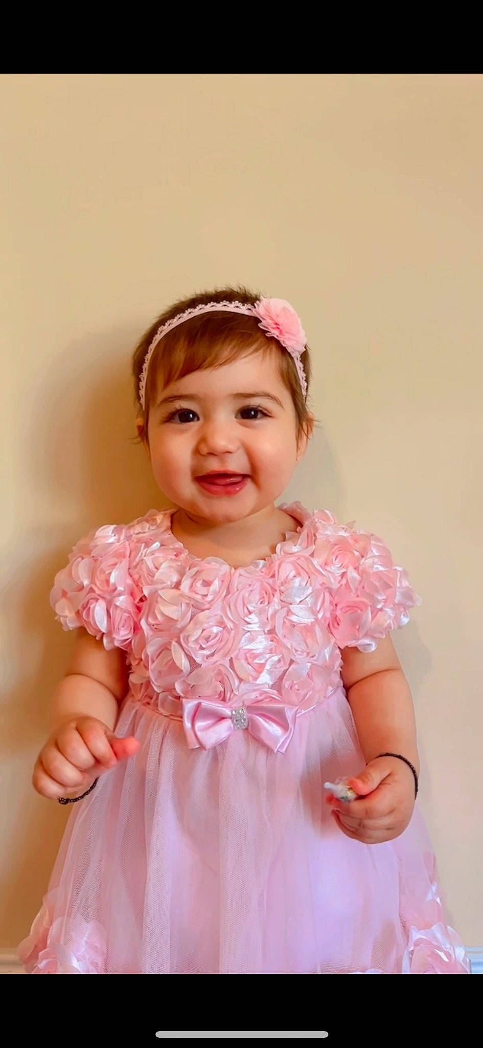 Ariya joined the competition — help win amazing prizes! baby_toddler_clothing, bridal_accessory, chin, day_dress, dress, embellishment, face, facial_expression, gesture, happy, head, headpiece, joy, magenta, neck, one_piece_garment, person, pink, skin, sleeve