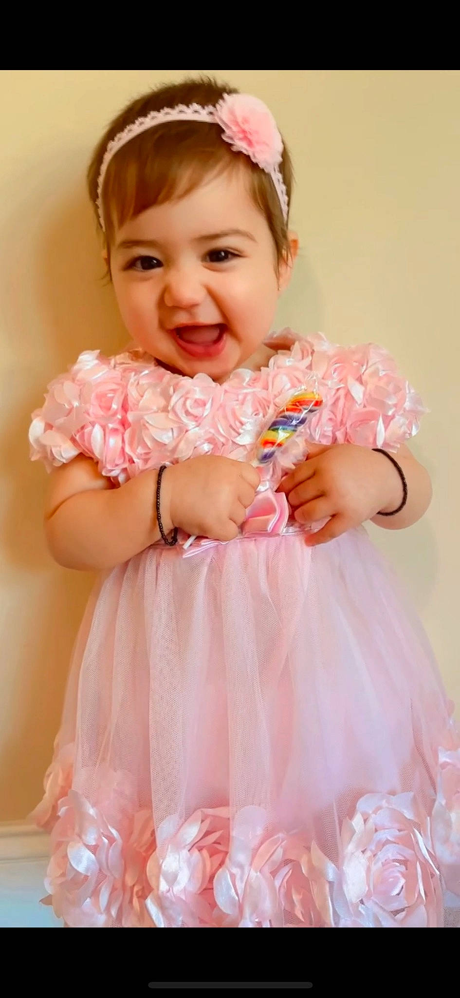 Ariya joined the competition — help win amazing prizes! baby_toddler_clothing, child, day_dress, dress, embellishment, finger, gesture, hand, happy, headpiece, human_body, joy, person, petal, pink, product, shoulder, skin, sleeve, smile