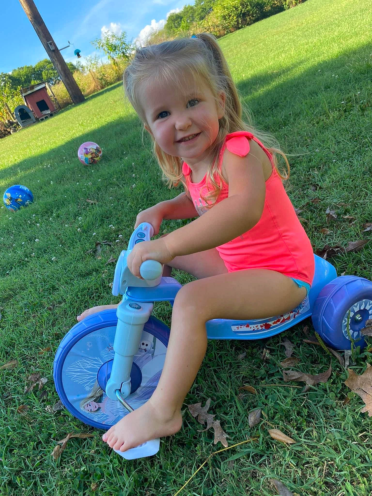 Meredith joined the competition — help win amazing prizes! baby_toddler_clothing, child, grass, grass_family, green, happy, joy, leg, leisure, people_in_nature, person, pink, plant, recreation, shoe, sky, smile, sneakers, thigh, toddler