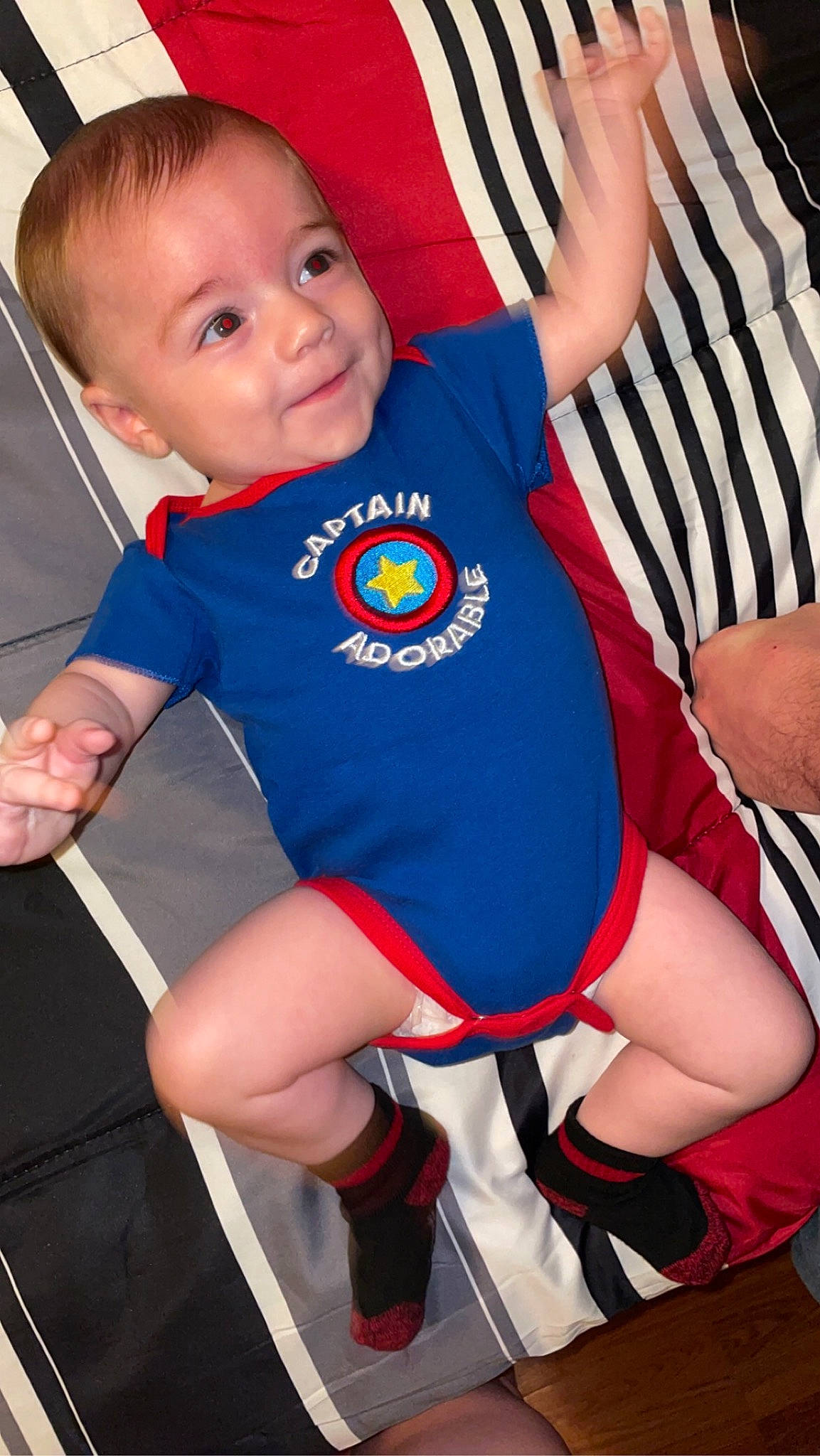 Waylen is registered to the contest to win money with this photo: baby, baby_toddler_clothing, child, electric_blue, human_leg, jersey, joint, knee, leg, pattern, person, red, shorts, sleeve, sock, sportswear, t_shirt, thigh, thumb, toddler