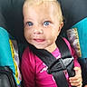 Catherine joined the competition — help win amazing prizes! baby, child, infant, car_seat, safety_harness, smiling, blue_eyes, blonde_hair, pink_clothing, portrait, close_up, sitting, vehicle_interior, turquoise, black_straps, happy, face, head, photograph,  안전