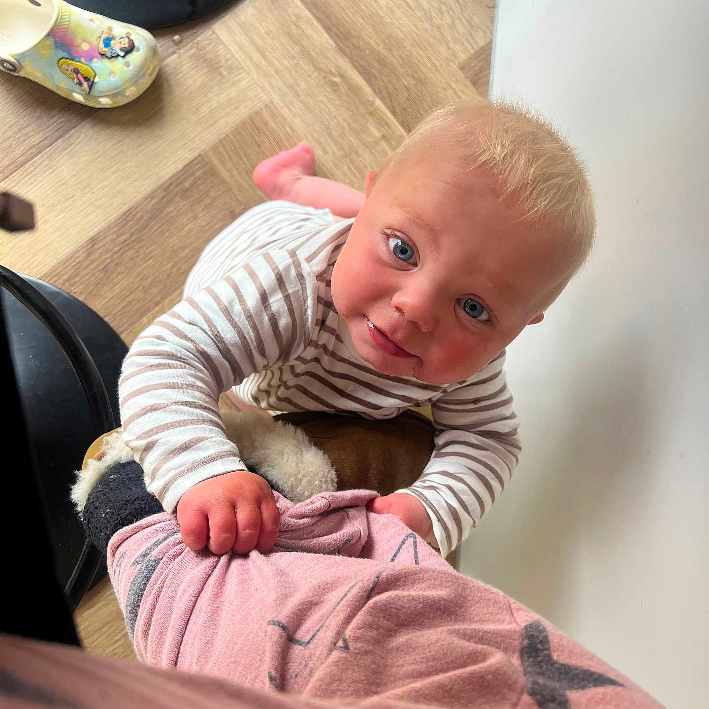 Arby is registered to the contest to win money with this photo: baby, babylaughing, blanket, bodypart, clothing, crawling, face, finger, footwear, hand, happy, head, indoors, interiordesign, pants, person, photography, portrait, sitting, smile