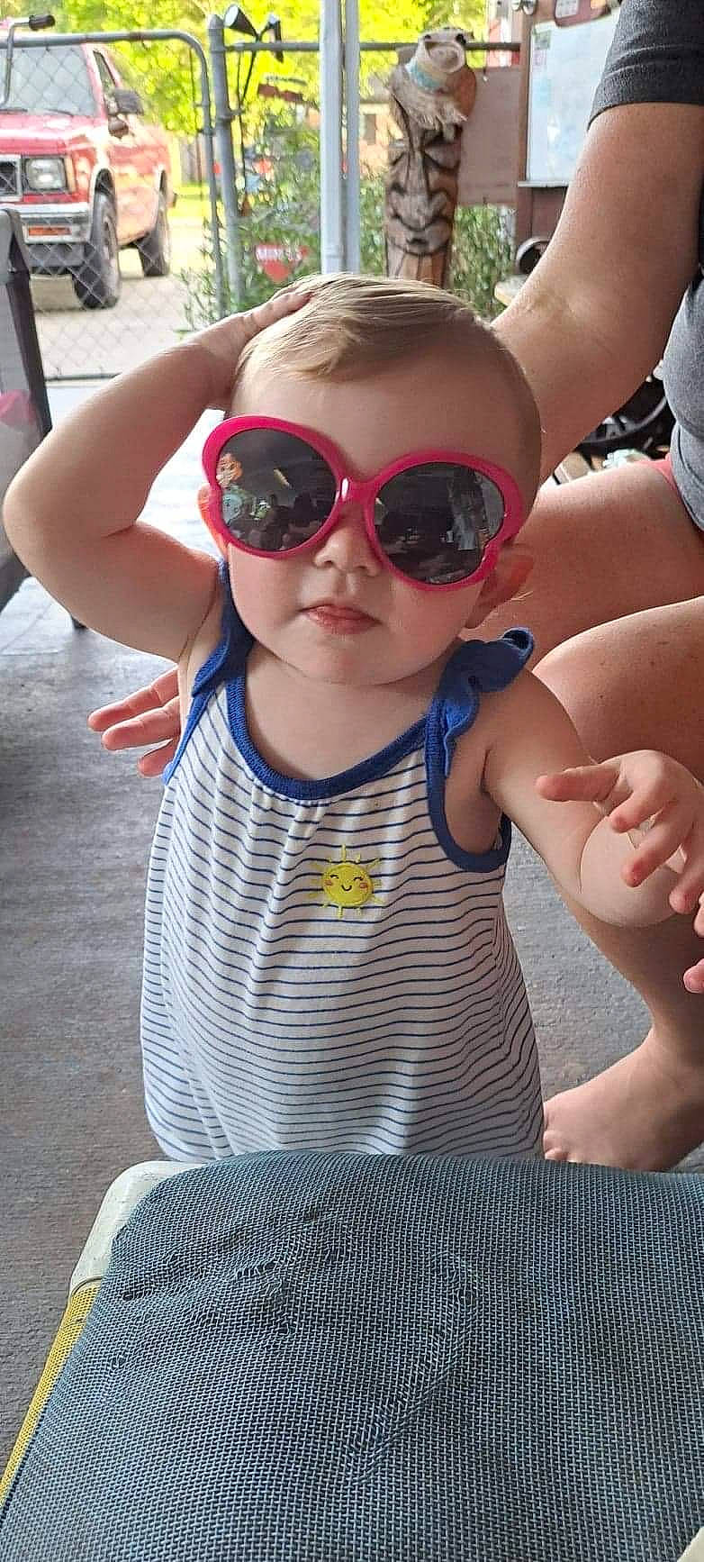 Alaina is registered to the contest to win money with this photo: baby_toddler_clothing, cool, eyewear, face, fashion, fun, glasses, goggles, hairstyle, happy, head, leisure, lip, person, photograph, pink, skin, sunglasses, toddler, vision_care