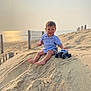 Adrian joined the competition — help win amazing prizes! toddler, child, beach, sand, toy, monster_truck, sunlight, smile, blue_shirt, shorts, outdoor, sand_dune, happy, barefoot, summer, sunset, fence, play, nature, portrait