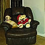 Daisy is registered to the contest to win money with this photo: dog, teddy_bear, armchair, recliner, leather_chair, living_room, tile_floor, pet, plush_toy, holiday_decor, pet_collar, flash_eyes, interior, furniture, cozy, sitting, soft_toy, shadow, wall, home