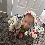 Odin joined the competition — help win amazing prizes! baby, blanket, candid, carpet, child, cords, cozy, door, eyes, feet, flooring, gaze, hood, indoors, infant, patterned_blanket, sitting, smile, tag, toes
