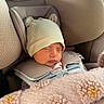 Aspen is registered to the contest to win money with this photo: baby, beige, blanket, car_seat, child, clothing, cozy, cute, hat, head_support, indoors, infant, pink, portrait, relaxed, resting, safety_harness, sleeping, soft_texture, toddler