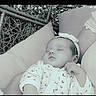 Anna participe au concours pour gagner de l'argent avec cette photo : baby, sleeping, headband, bow, cushion, wicker, monochrome, black_and_white, infant, peaceful, portrait, close_up, soft_lighting, resting, child, cute, newborn, relaxing, indoors, person