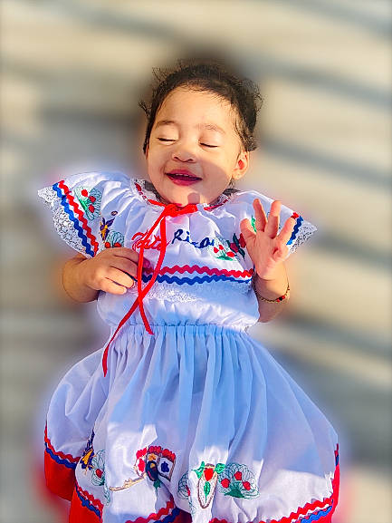 Zyana is registered to the contest to win money with this photo: arm, baby_toddler_clothing, clothing, day_dress, dress, electric_blue, entertainment, event, face, flash_photography, fun, happy, performing_arts, person, red, skin, sleeve, smile, t_shirt, toddler