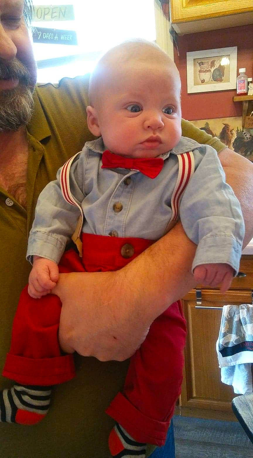 Bentlee is registered to the contest to win money with this photo: arm, boy, cheek, child, cool, fun, infant, person, product, sitting, skin, smile, toddler