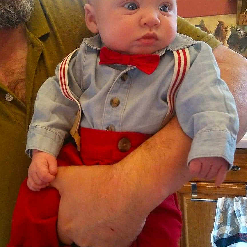 Bentlee is registered to the contest to win money with this photo: arm, boy, cheek, child, cool, fun, infant, person, product, sitting, skin, smile, toddler