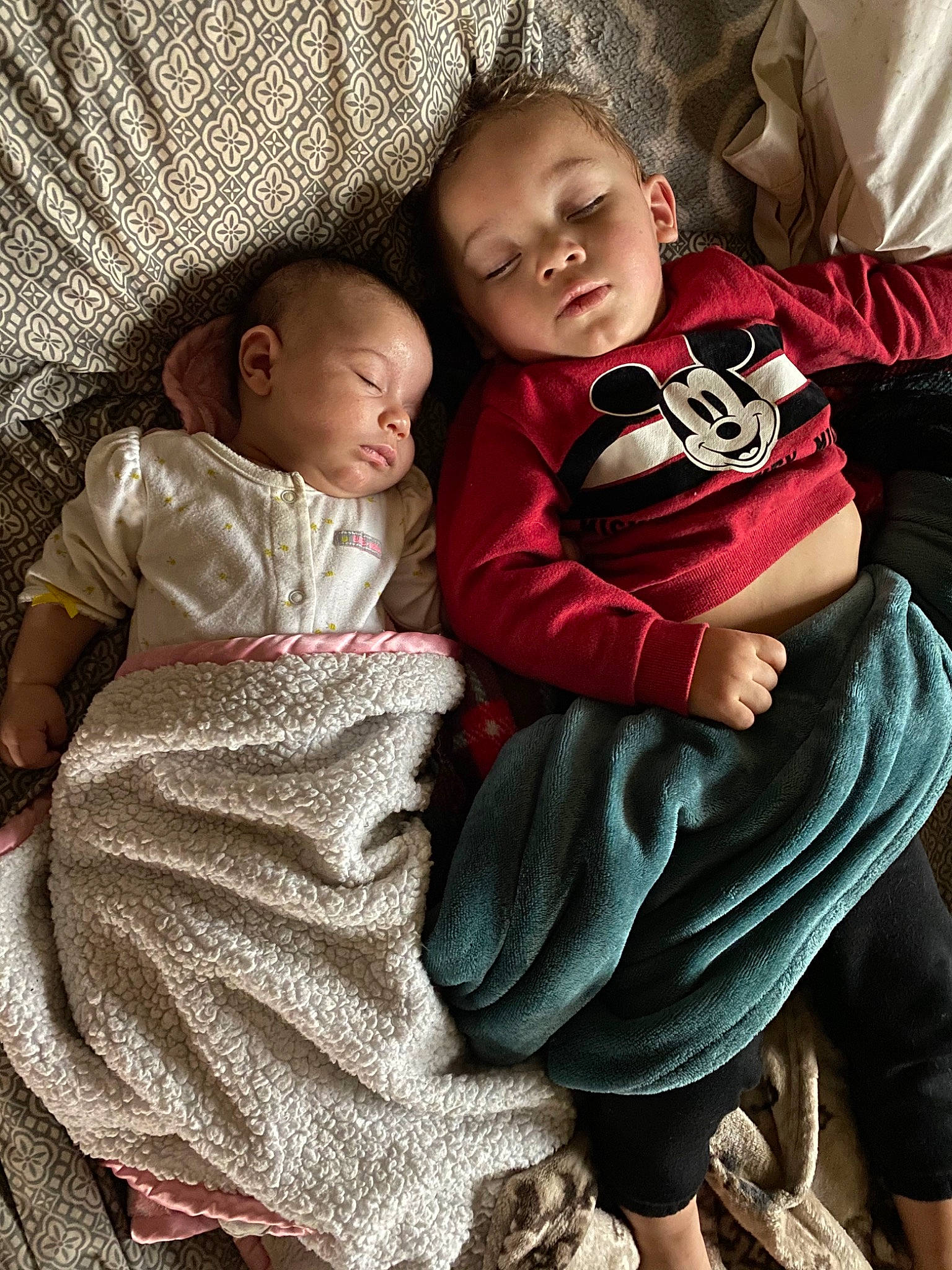 Kobie is registered to the contest to win money with this photo: baby, cheek, child, family, happy, hug, human, interaction, people, person, sibling, sitting, skin, sleep, smile, toddler