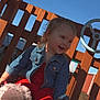 Scarlett is registered to the contest to win money with this photo: blue_sky, casual_clothing, child, cute, daytime, denim_jacket, feet, happy, outdoor, person, playground, playtime, red_outfit, slippers, smiling, sunlight, toddler, toy_steering_wheel, wooden_structure, young_child