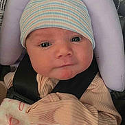 Adessa joined the competition — help win amazing prizes! apparel, baby, blanket, car_seat, child, child_baby, clothing, cute, face, hat, human, indoor, infant, newborn, person, portrait, restraint, seatbelt, sitting, warm