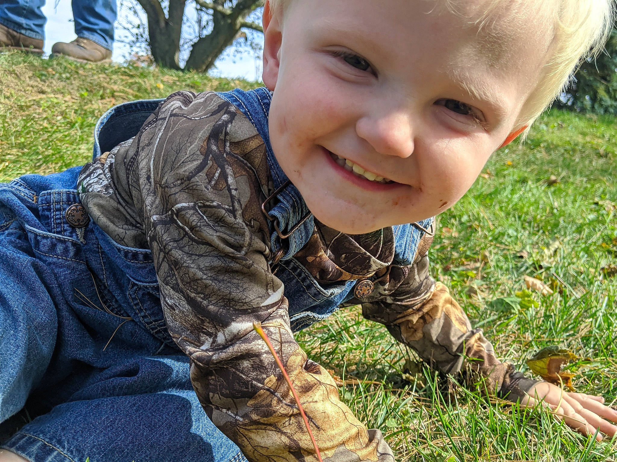 Tyler joined the competition — help win amazing prizes! adaptation, child, grass, hand, joy, lawn, person, plant, play, sitting, smile, toddler, tree