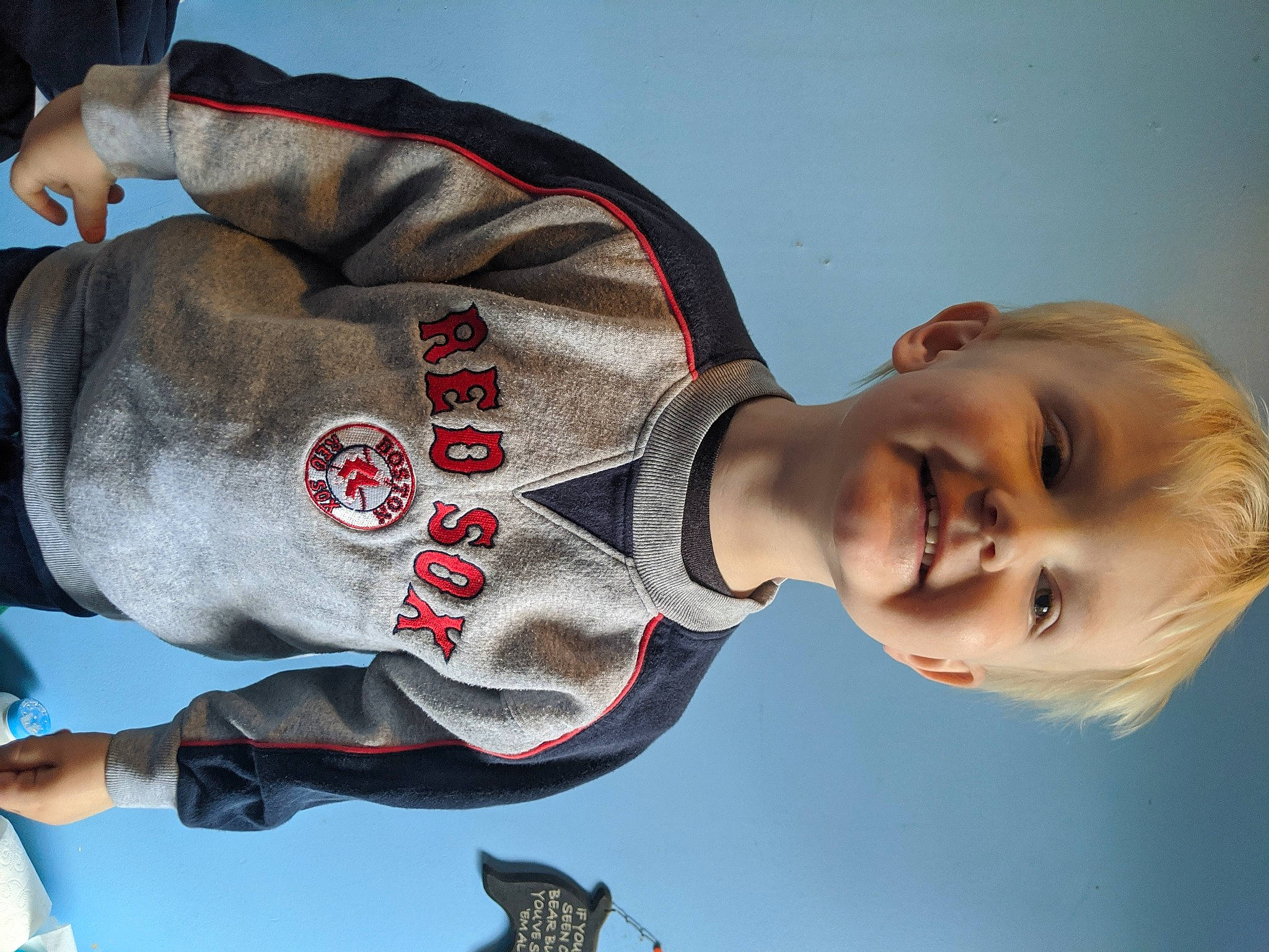 Tyler is registered to the contest to win money with this photo: arm, child, elbow, joy, person, sports_uniform