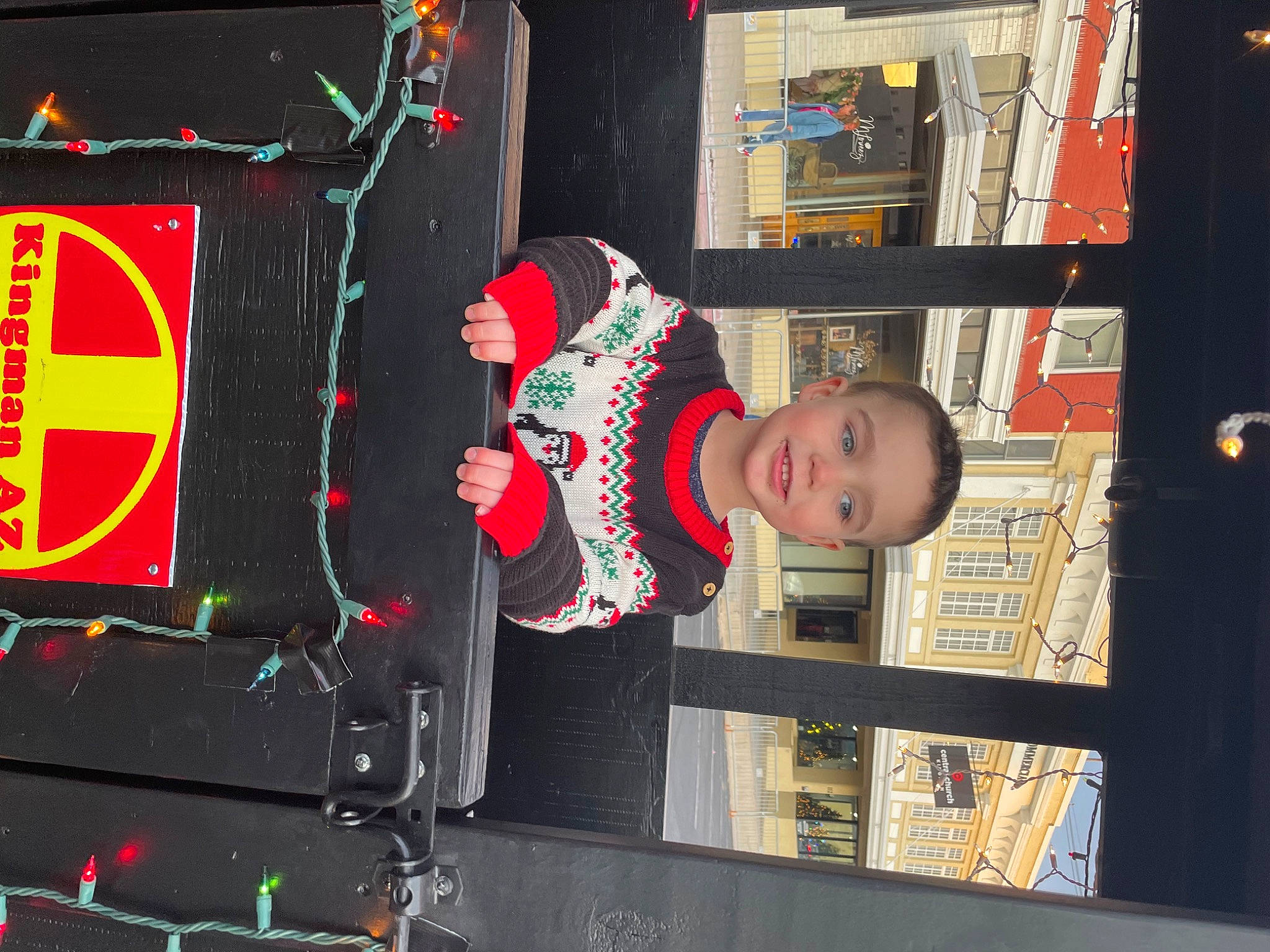 Matthias is registered to the contest to win money with this photo: automotive_exterior, event, joy, machine, motor_vehicle, person, room, standing, t_shirt, technology, toddler