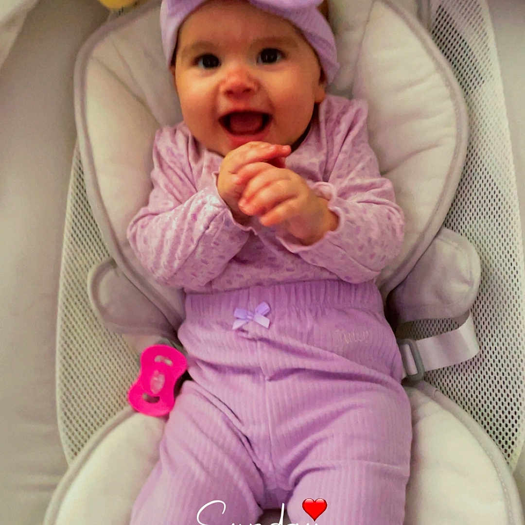 Evelyn is registered to the contest to win money with this photo: baby, bed, bonnet, cap, clothing, cradle, crib, cushion, face, furniture, happy, hat, head, homedecor, infantbed, newborn, person, photography, portrait, smile